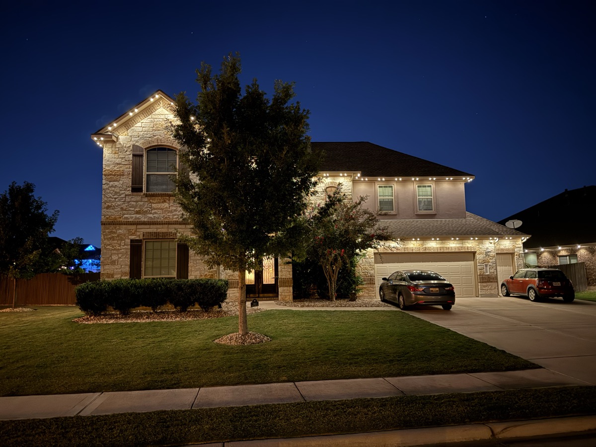 Permanent LED mood lighting creating ambiance on an Austin Hill Country home